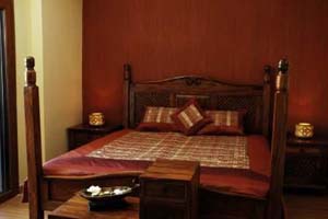 2 person executive suite with pool view, king bed, an extra bed, private facilities (bath and shower), and breakfast